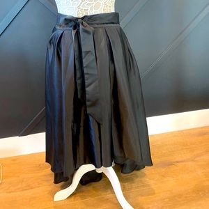 Satin skirt with tie bow in front  size M